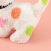 The 2025 new cute plush tongue-sticking electric polka dot cat children's simulation toy can walk, move and meow Item Picture